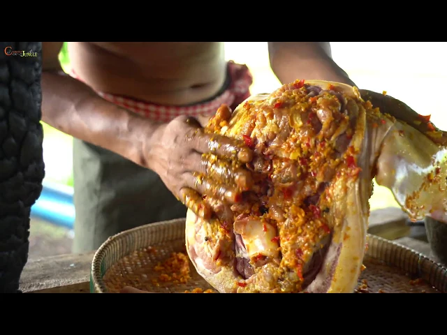 wow!amazing cooking pig head under soil recipe and eating delicious